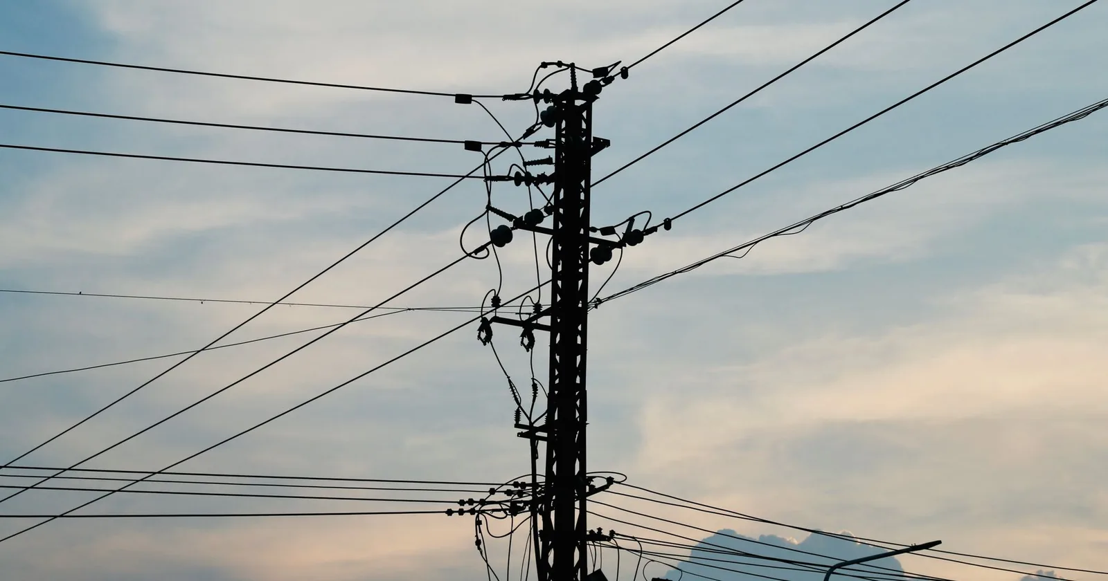 Utility pole carrying many overhead power lines